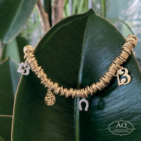 Bracciale elastico con ciondoli portafortuna in argento dorato  - LINEA FORTUNA