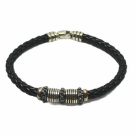 Bracciale con pelle intrecciata e argento brunito